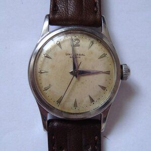 VINTAGE WIND UP UNIVERSAL GENEVE .MID SIZE 28 MM ,BROKEN SETTING BRIDGE